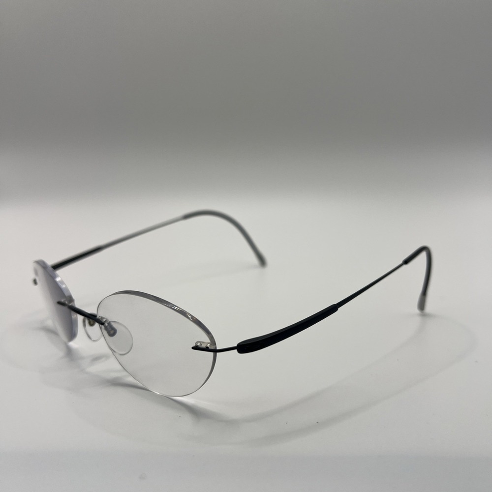 Silhouette 6779 7719 Eyeglasses FRAMES Only Matte Black 52[]17-135 Titanium